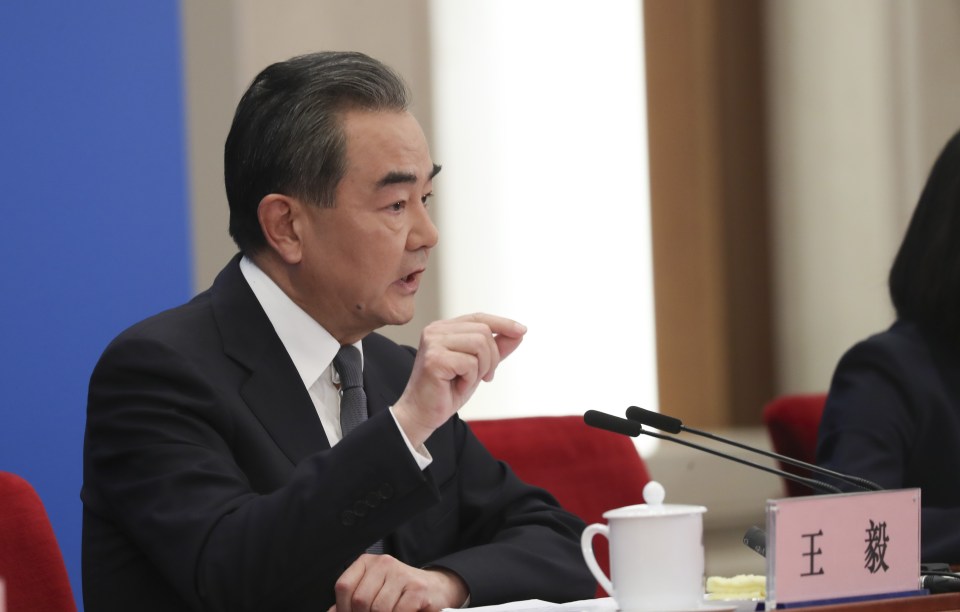  Foreign Minister Wang Yi attends a press conference where he threatened the West with a new cold war