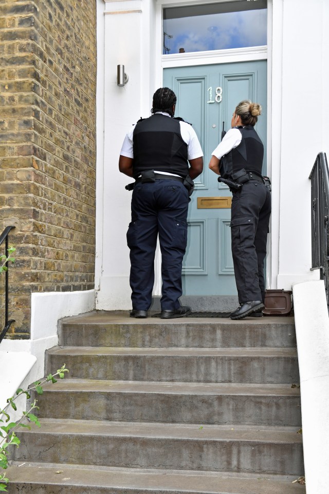 Police officers arrive at Dominic Cummings’ Islington home on Sunday