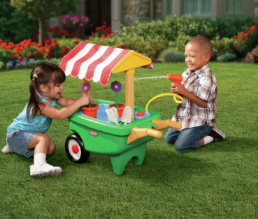 The wheelbarrow set comes with a working sprinkler