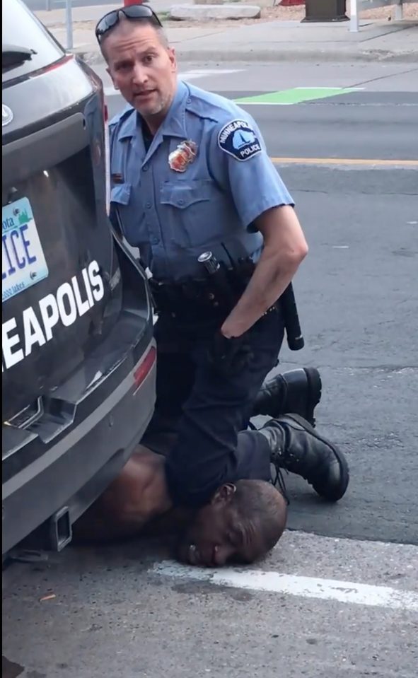  Derek Chauvin is seen with his knee on George Floyd, who later died