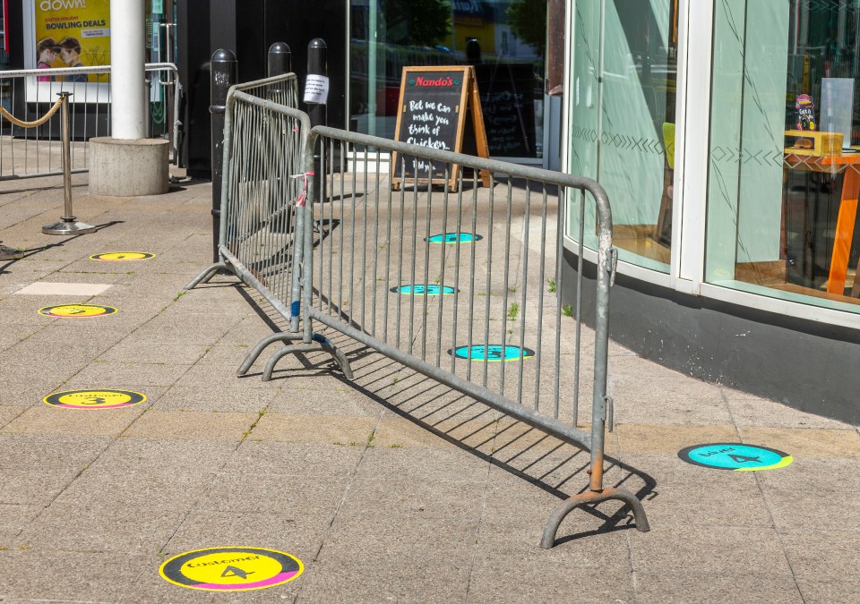 Markers on the floor tell customers where to stand at the Scottish restaurant