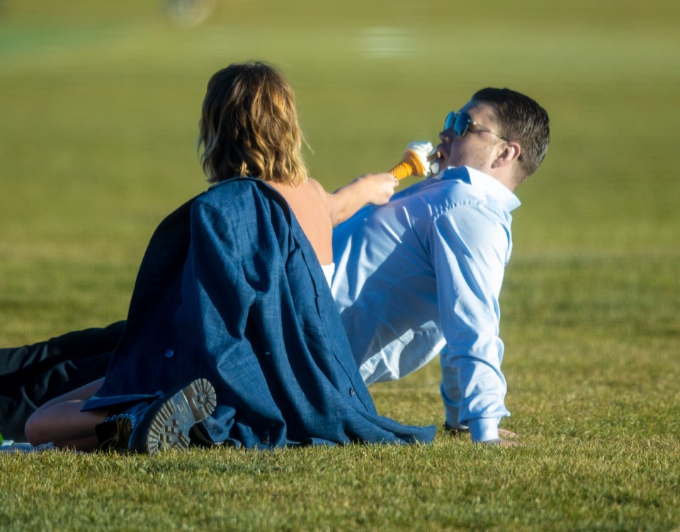  The couple were seen sharing an ice cream as they made the most of the sunshine on Friday