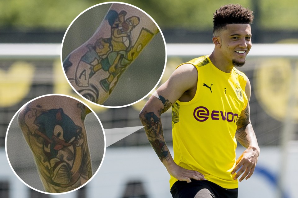  Man Utd star Jadon Sancho sporting his cartoon tattoos at during a Borussia Dortmund training session