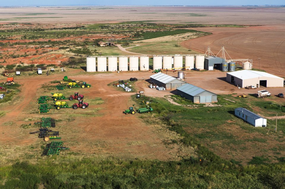  Agricultural machinery is seen across the gigantic swathes of land