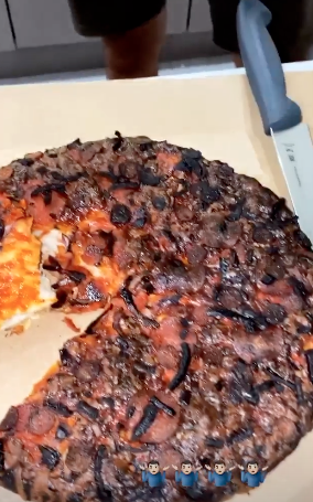  Tommy later shared a snap of the burnt pizza