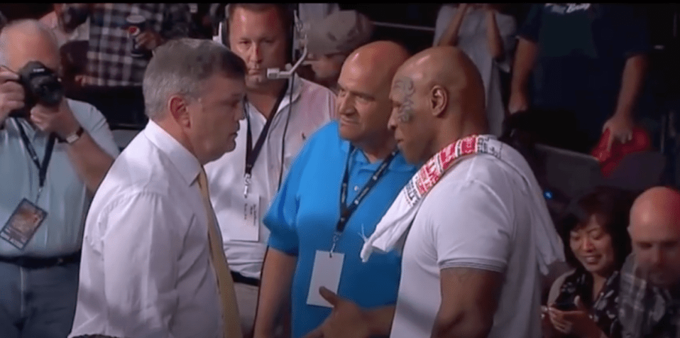 Atlas and Tyson embrace at a boxing show in 2013