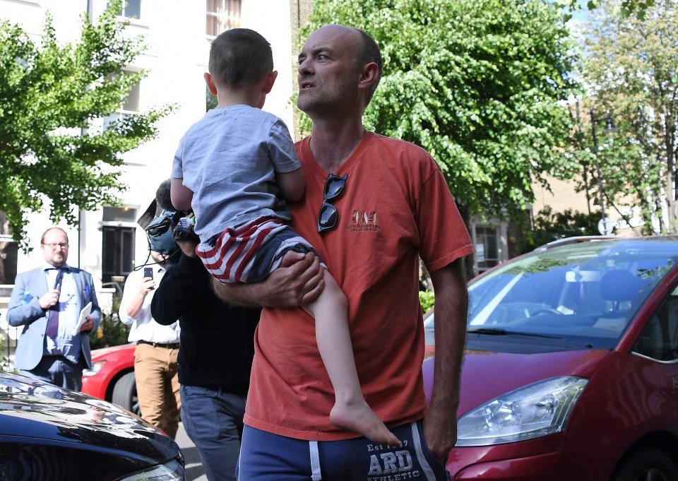  Cummings with his son outside his home in London