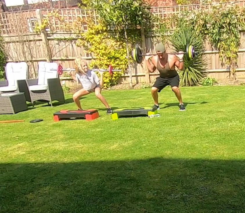  The star and his daughter were shown working out in the sunshine at their Surrey home