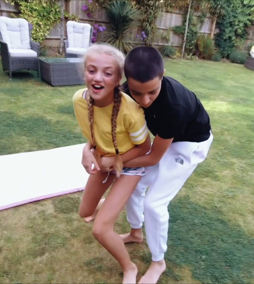  Junior and Princess, Peter's children with ex-wife Katie Price, are shown messing around in the garden