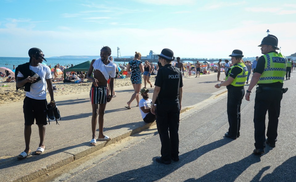 Police patrolled the busy Bournemouth beach yesterday