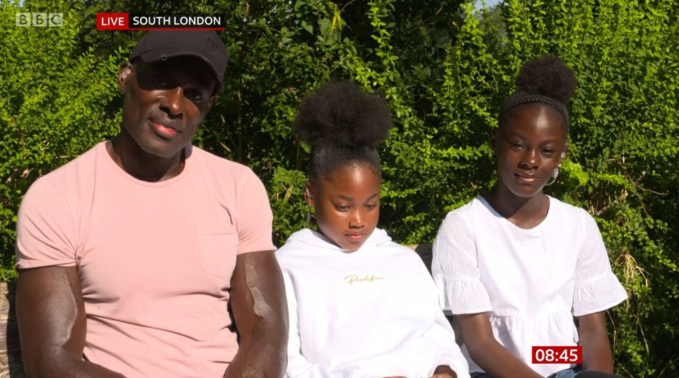 BLM hero Patrick Hutchinson and his two daughters, Sidena and Kendal, appearing on BBC Breakfast