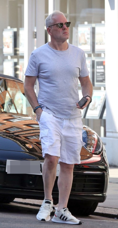 Chris Moyles shows off his new hairdo and slimmed-down figure