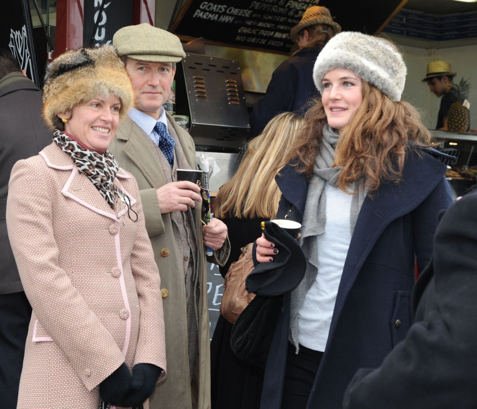 The couple (left) with their daughter Evie (right)