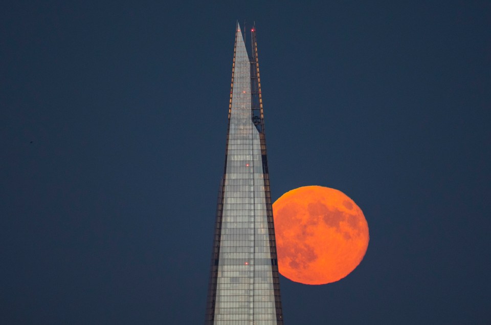 The 2018 Strawberry Moon next to the Shard in London