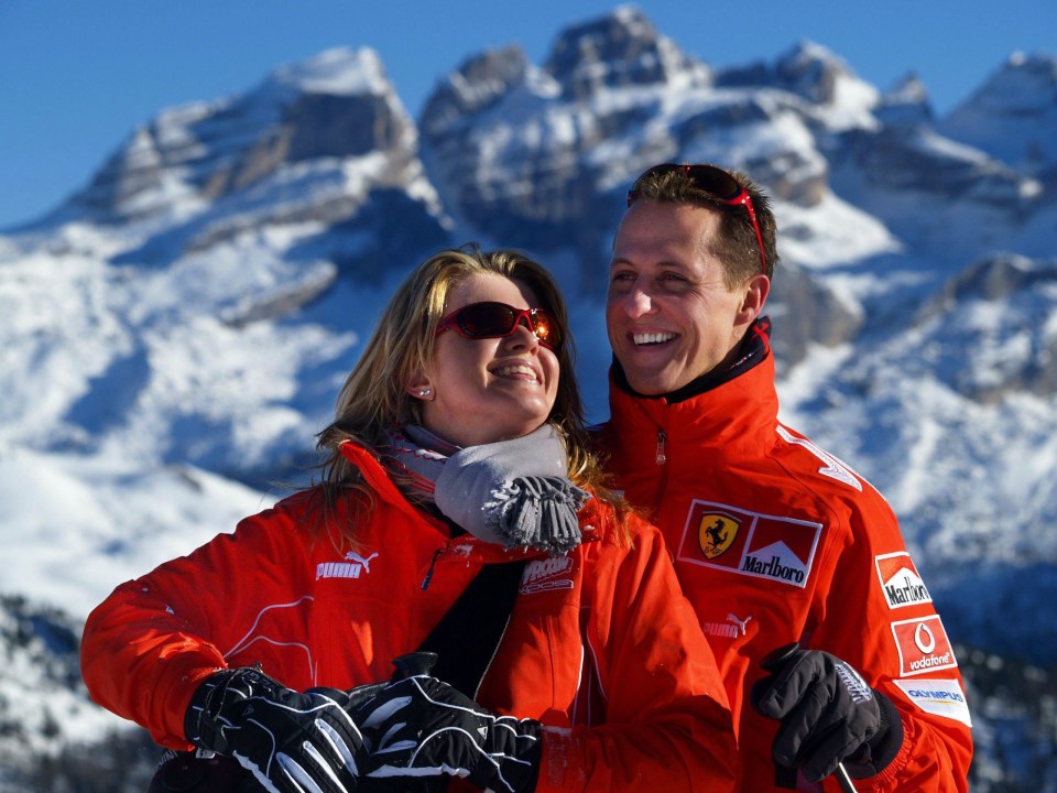 Michael Schumacher poses with his wife Corinna on the slopes in 2005