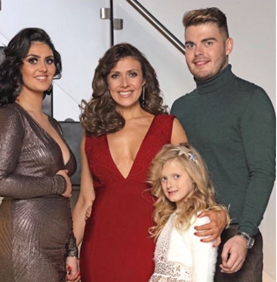 The TV star pictured with her children Emily, Polly and David