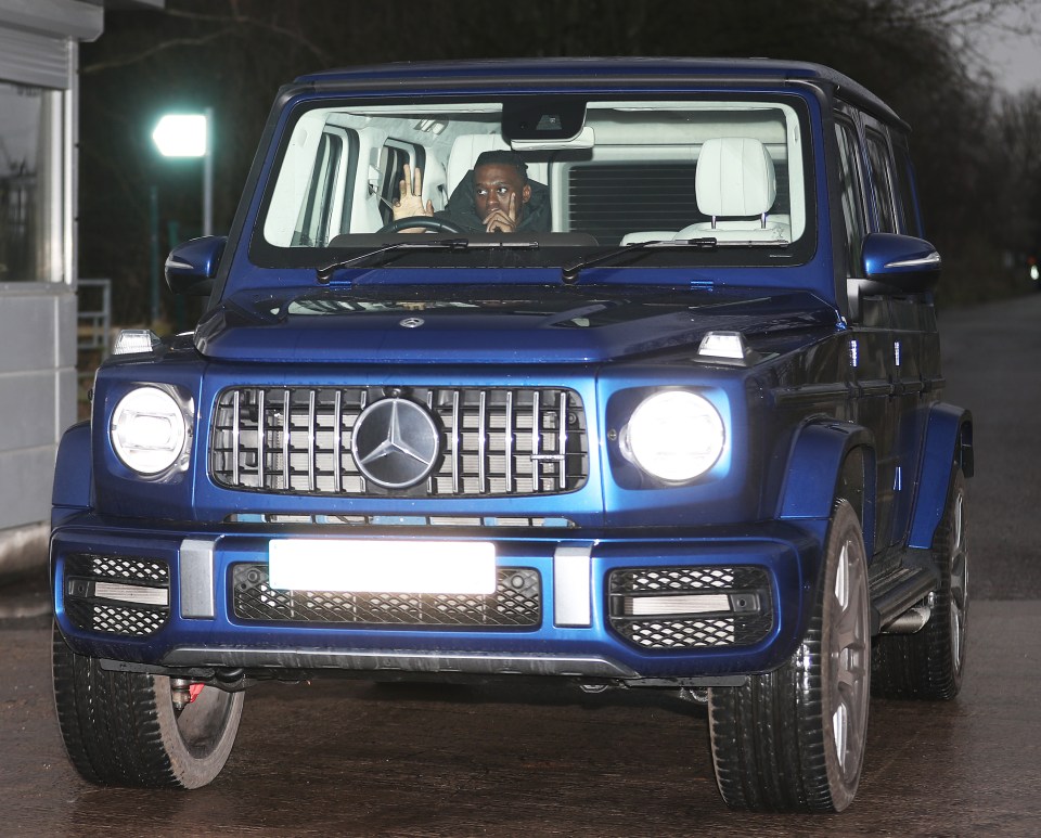  Defender Aaron Wan-Bissaka cruises around in his bulky cruiser