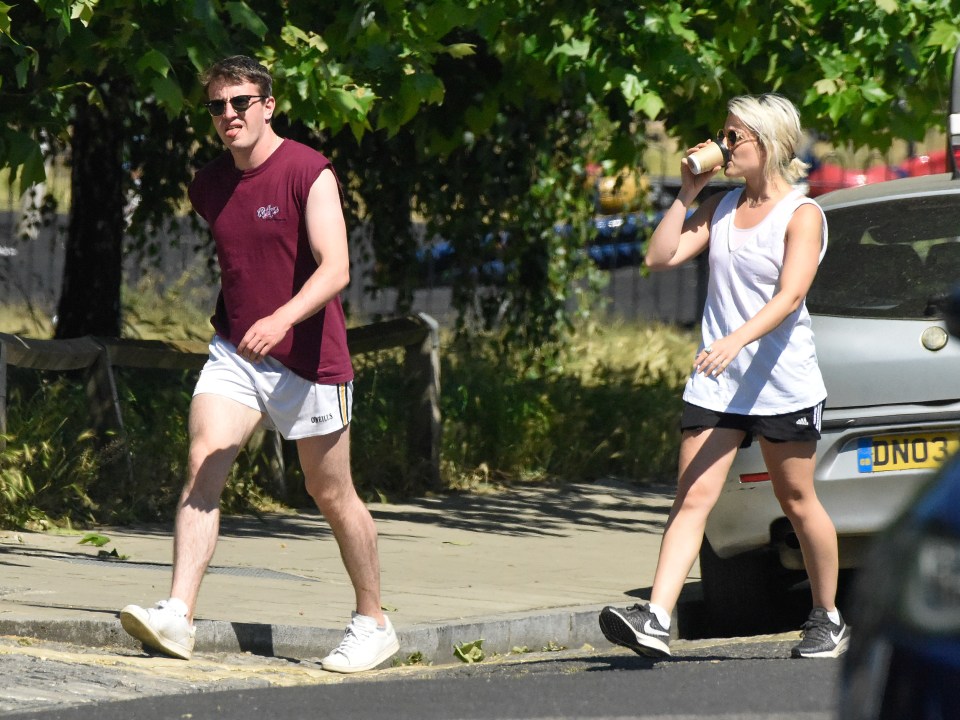  India wore a baggy vest and black shorts as she sipped on her coffee