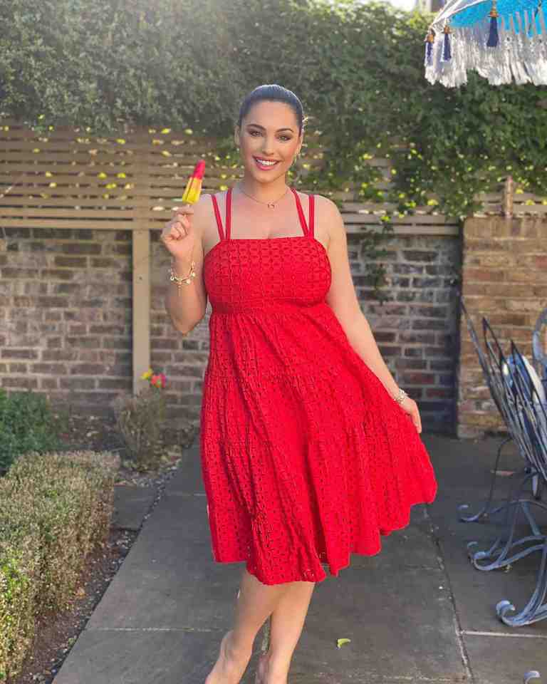 Kelly Brook,40,  managed to match her lolly to her frock as she snapped herself in a red-hot summer dress