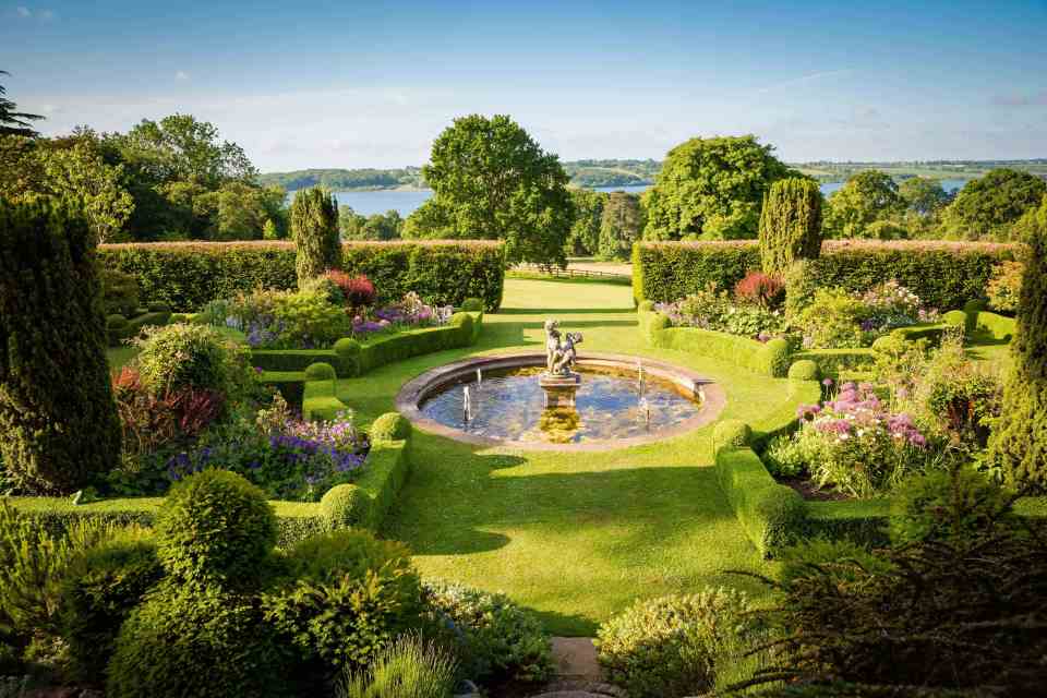   Hambleton Hall's neatly kept gardens light up a beautiful setting