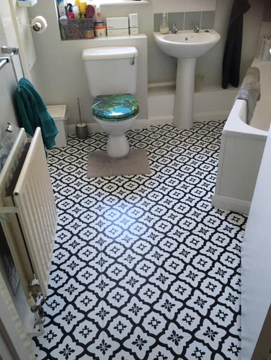 She gave it a bright and fresh makeover in minutes using self adhesive tiles from Dunelm