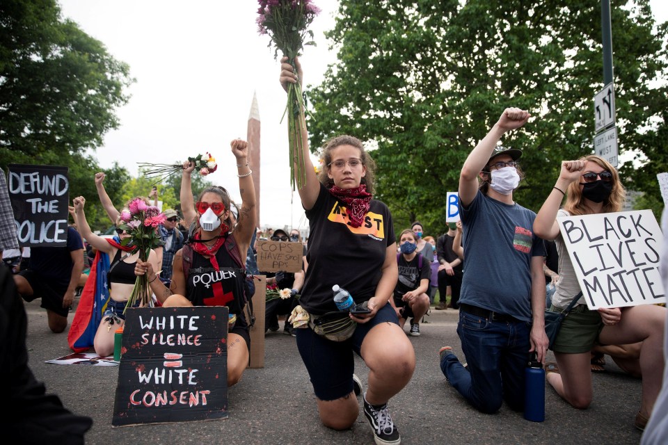  Protesters take a knee and observe minutes of silence in Denver, Colorado