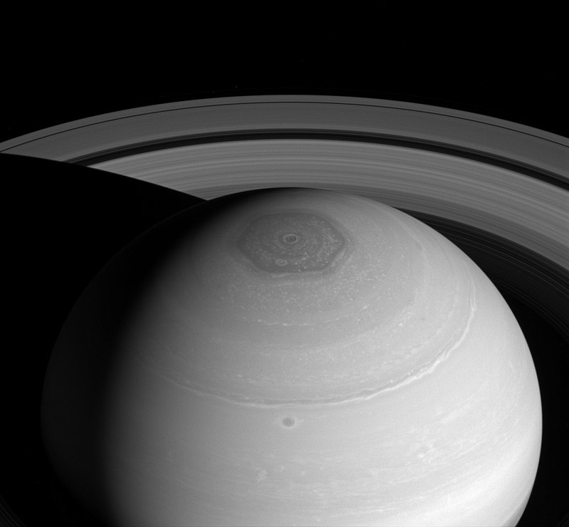 You can make out the hexagon shape on this black and white image of Saturn