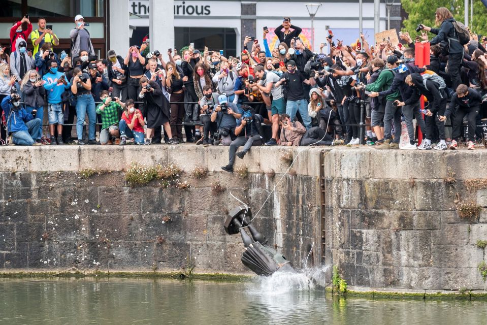 The statue was dragged from its plinth and pushed into the harbour