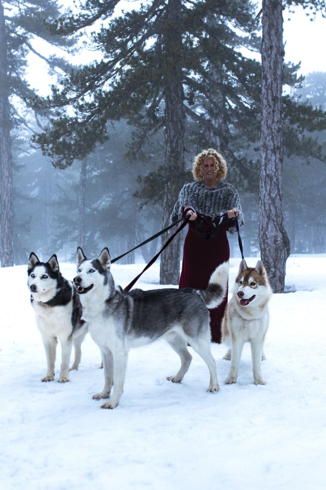 Ali Rhind and her dogs Dolce, Lulu and Dante on the slopes of the Troodos mountains