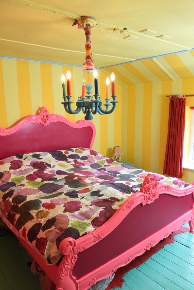 Mary Rose's home is full of bright colours - including a pink bed