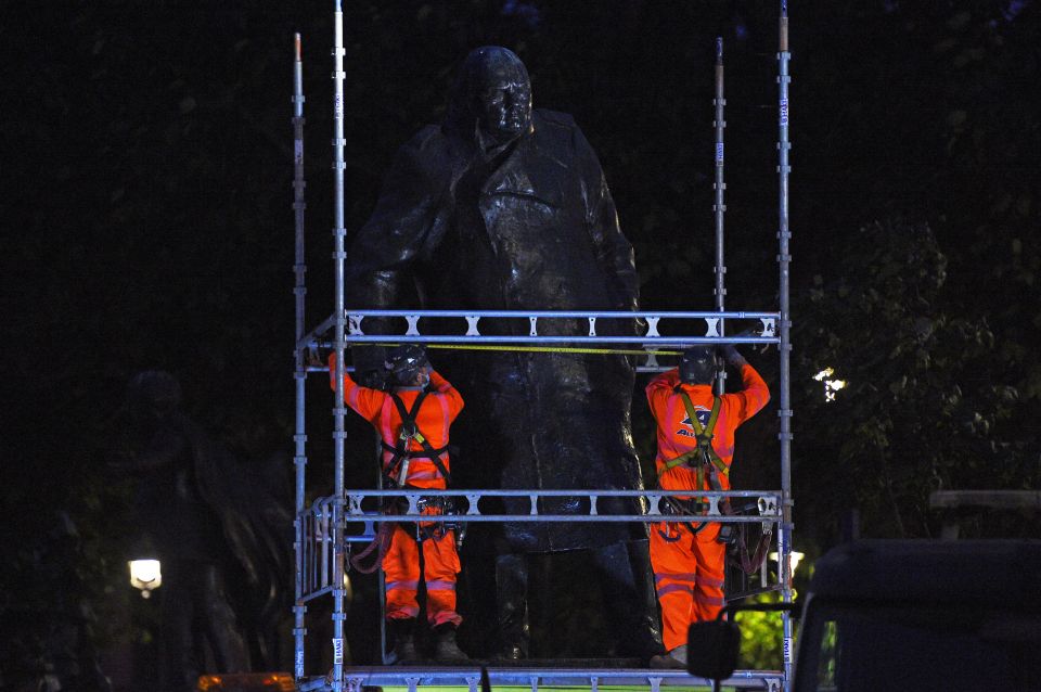 Scaffolding going up around the statue 