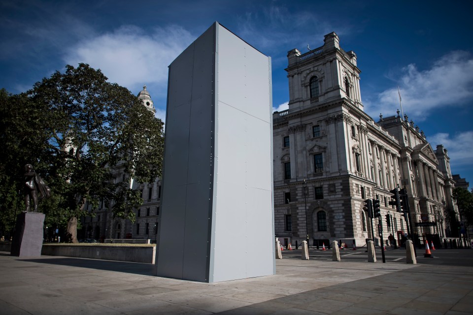 A statue of former British Prime Minster Winston Churchill boarded up in Westminster