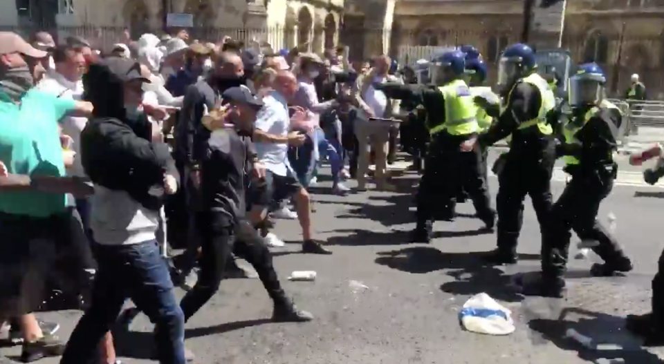  Far-right thugs clash with police in Parliament Square on Saturday