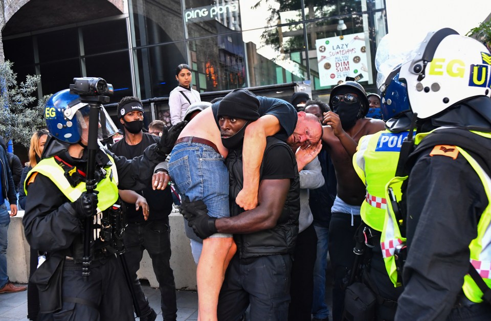 The Black Lives Matter supporter carried the injured man from an opposing group to safety