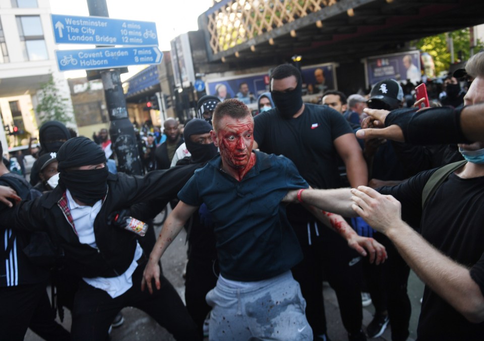 The groups clashed as they met at Waterloo Station with one protester left bloodied