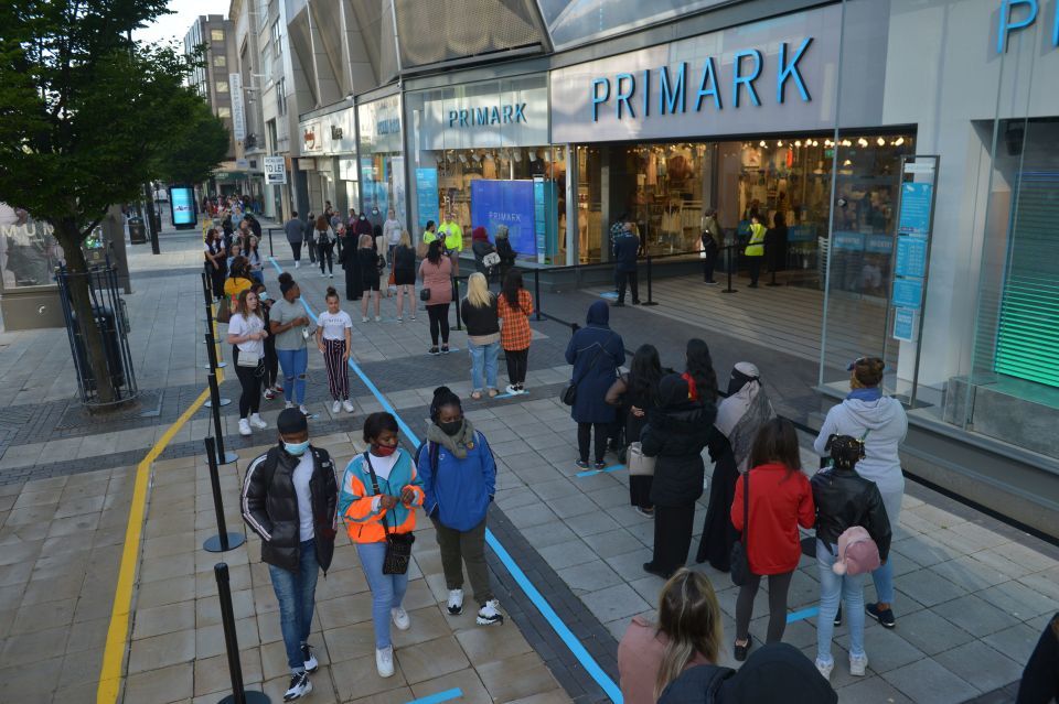 Primark customers queuing outside its flagship Birmingham store