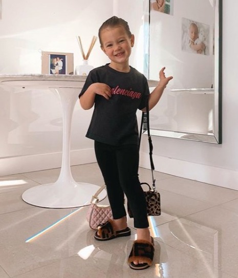 Rosie Balenciaga t-shirt costs £170, her furry Fendi sliders are another £270 and her Dolce and Gabanna handbag is £450