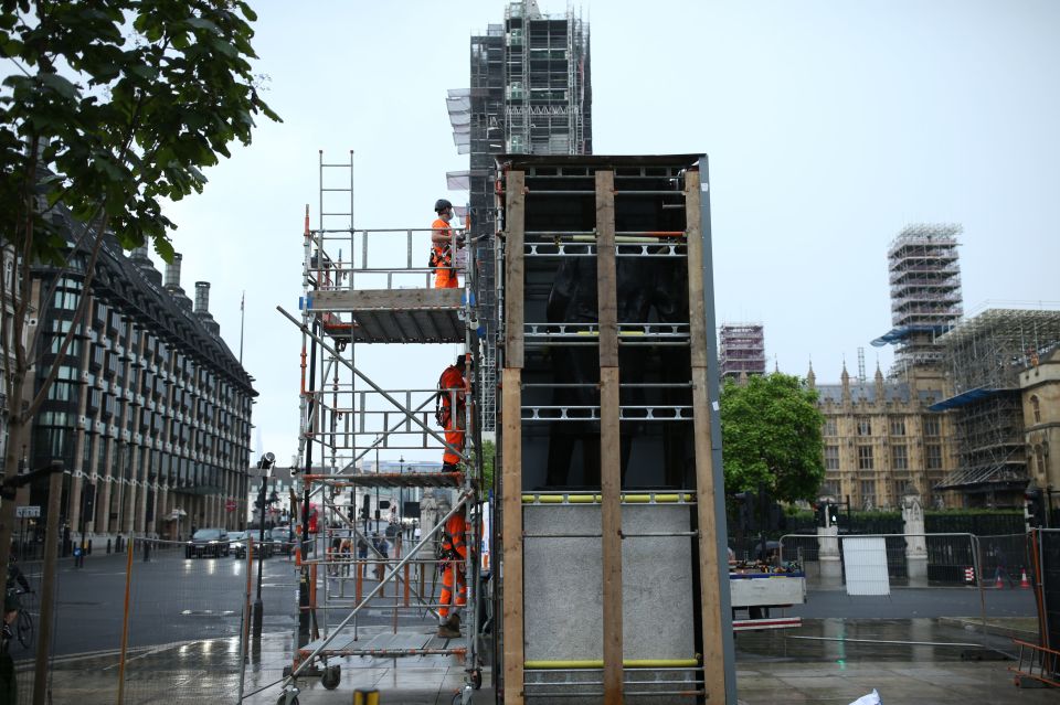 The protective casing was being removed ahead of a visit to London by Emmanuel Macron