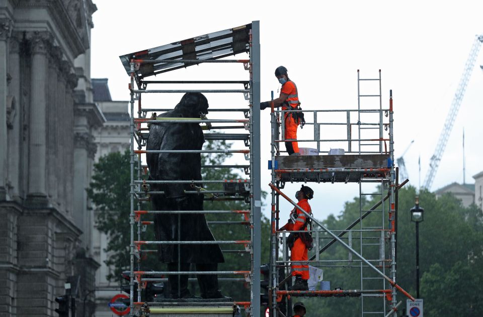 Workers had started removing the metal panels earlier today