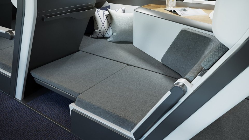 They can then fold out a padded section where the footwell is, and it links their seat to the space on the side 