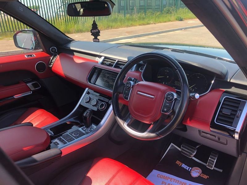 The motor features lush red and black interiors