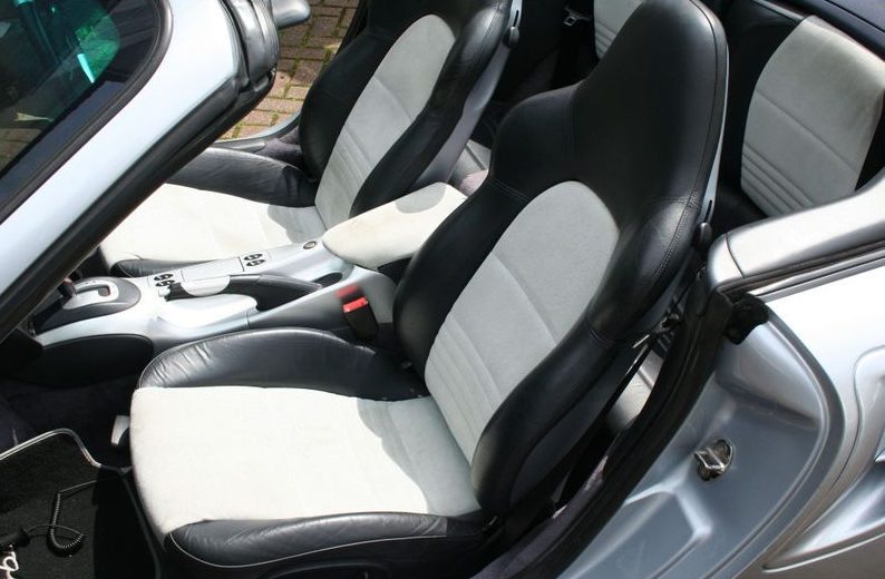 The stylish interiors feature custom alcantara with metropole blue leather