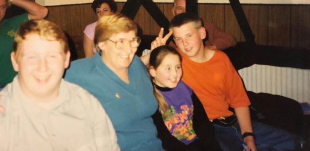 Andrew, left, Kim, centre right, and Christopher Colbeck, right, as kids, with their mum Nadine, centre left