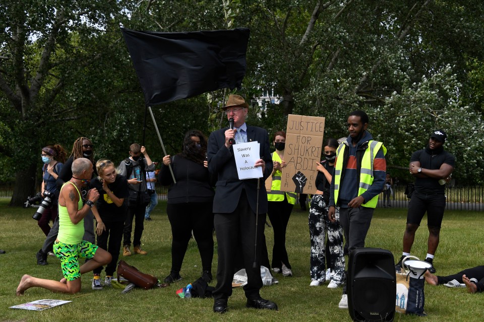 An activist giving a speech during the protest in Hyde Park, London