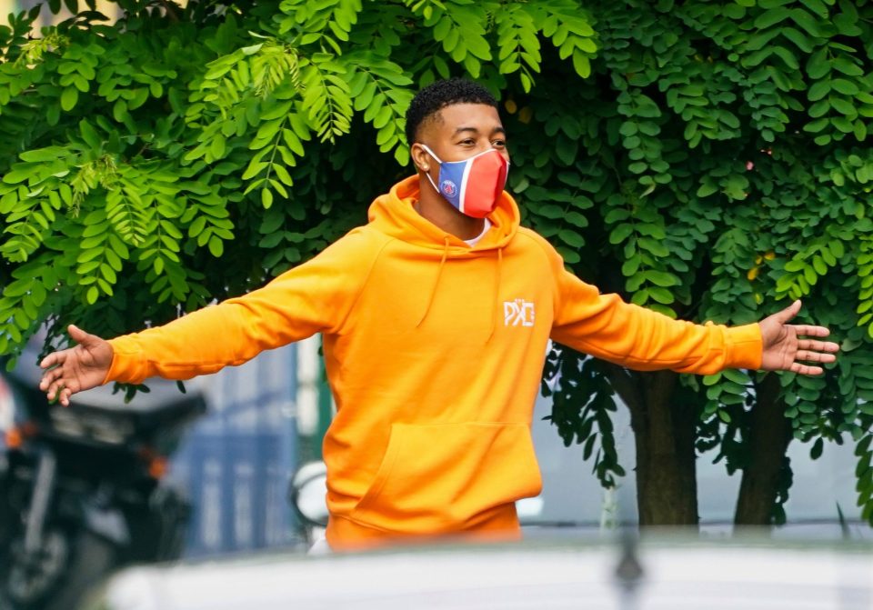 There was no chance of missing Presnel Kimpembe as he rolled in wearing a bright orange hoody