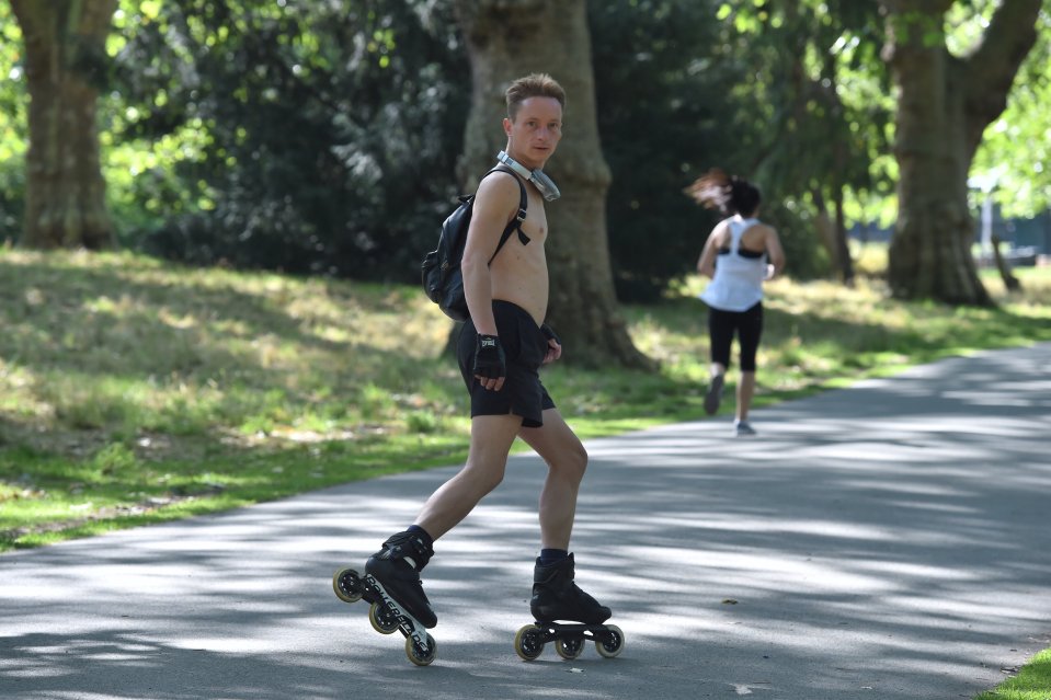 Londoners enjoying the sunshine at Southwark Park this morning