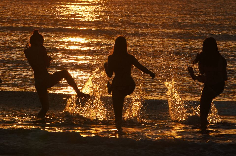 People enjoying the sunshine on Tynemouth beach in the North East