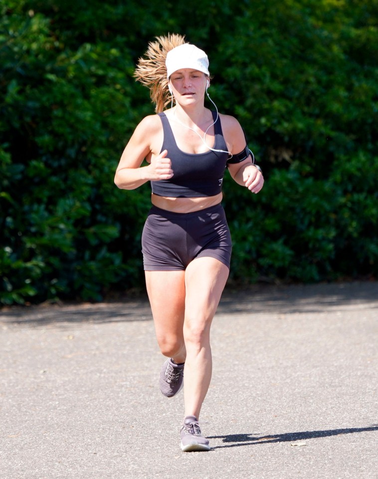 A jogger heads out for a run at Battersea Park in London