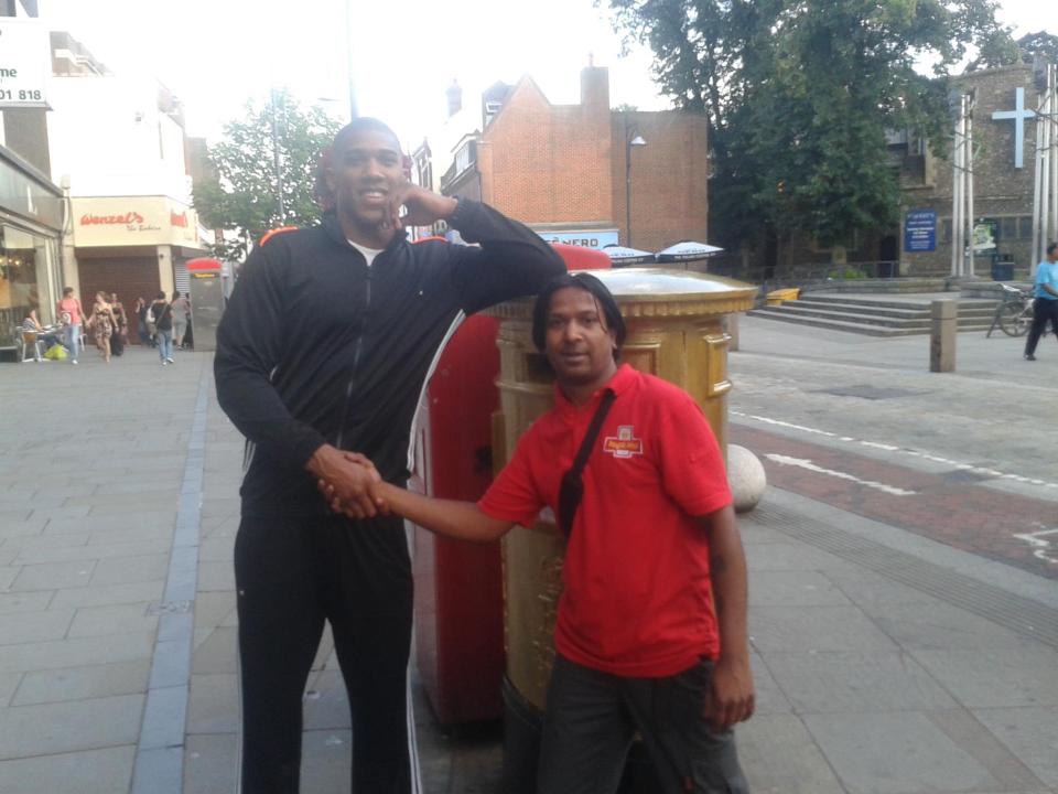 Roo Rawal with British professional boxer Anthony Joshua