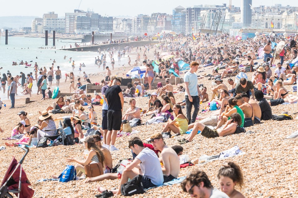 Brighton beach was packed on Tuesday as the temperature topped 28C